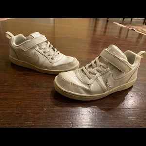 Boy’s White Nike Sneakers